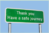 Road Sign that says "Thank you. Have a safe journey."